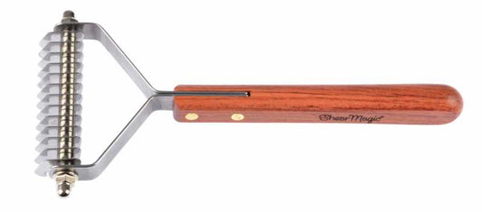 A professional wide undercoat rake with stainless steel blades and a wooden handle, featuring the Shear Magic brand logo.